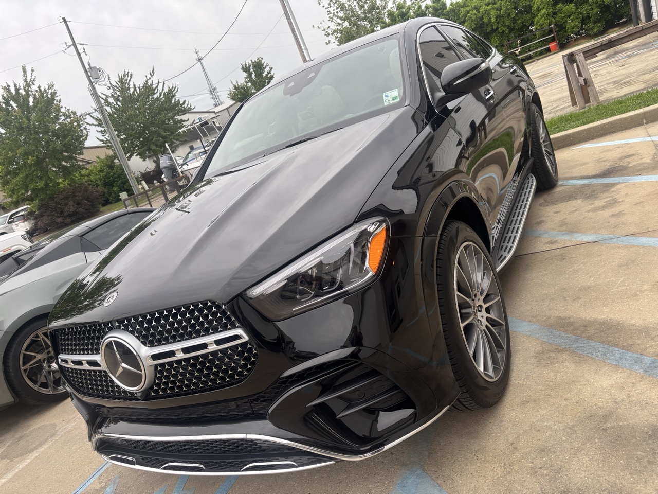 A freshly detailed black luxury sedan